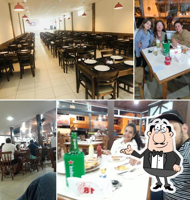 O interior do Te Contei Lanches e Pizzas