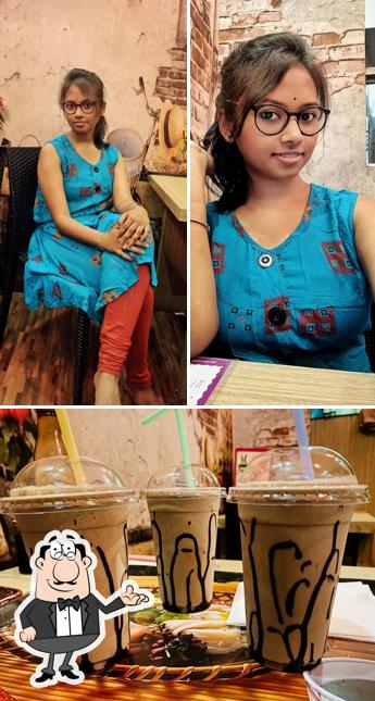 This is the photo displaying interior and drink at Strawberry Cafe