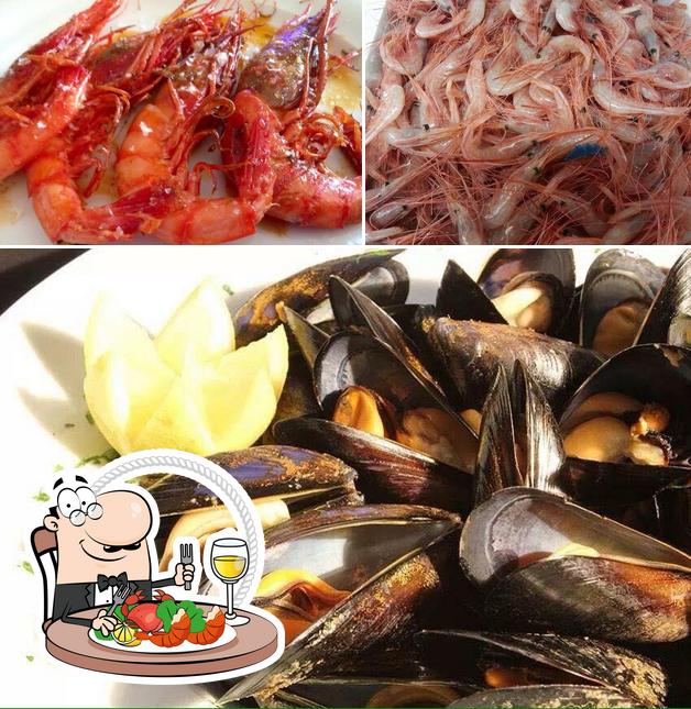 Get seafood at Restaurante Maïmar