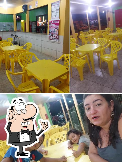 O interior do Lanchonete e Pizzaria - ACONCHEGO