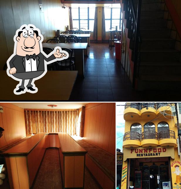 Take a seat at one of the tables at Fun & Food Restaurant