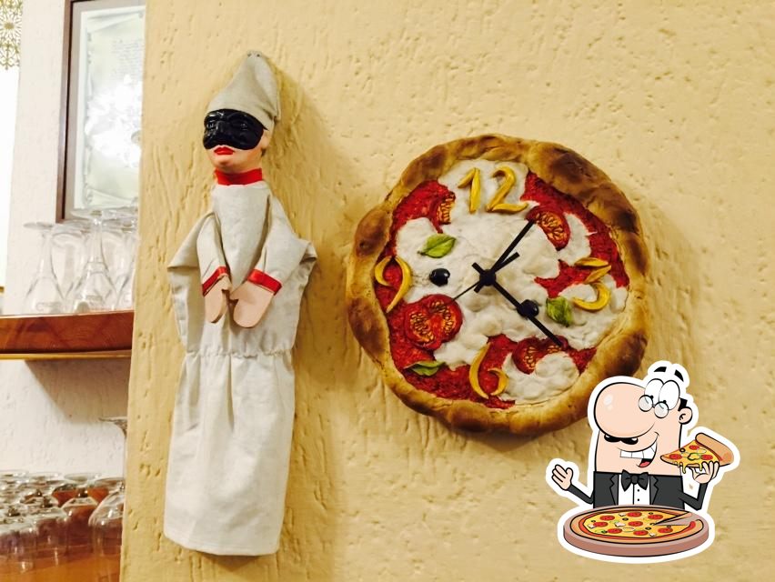 Prenditi una pizza a Acunzo Pizzeria.