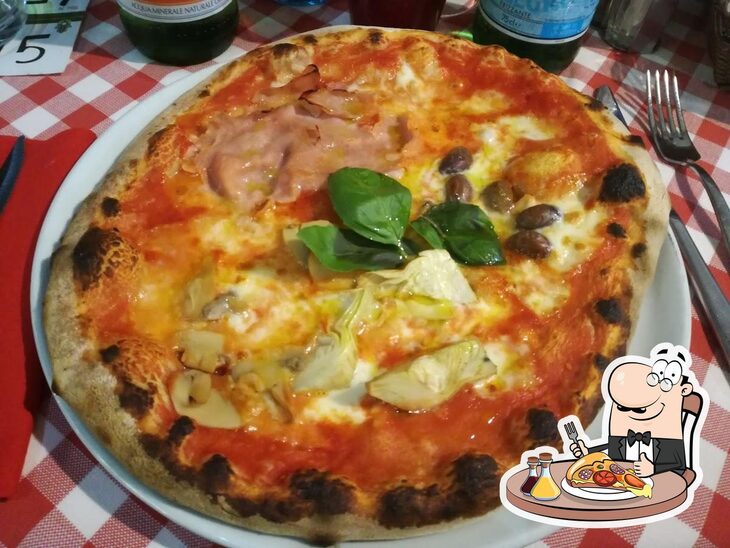 Prova una pizza a Pizzeria 'Il Maggiolino'.