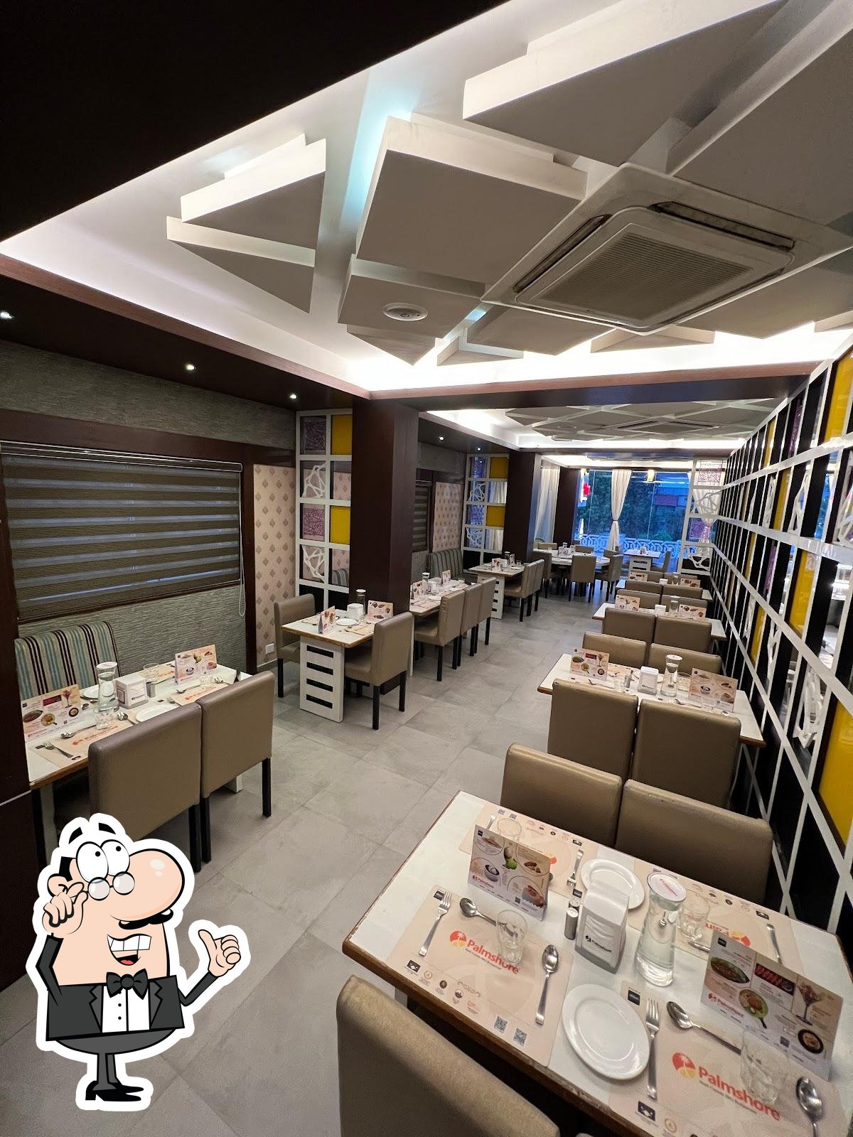 Check out how Palmshore Restaurant Ramapuram looks inside.