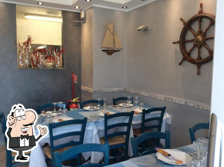 Siediti a un tavolo di Ristorante Il Porticciolo.