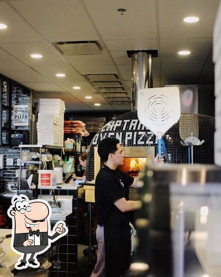 The interior of Captain's Oven Pizza Surrey.