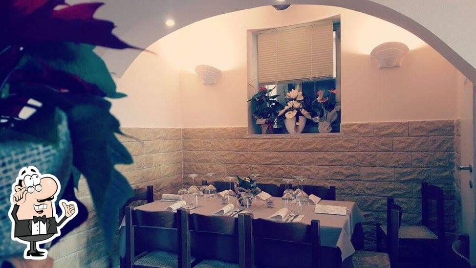 Siediti a un tavolo di Ristorante Pizzeria Sapori di Mare.