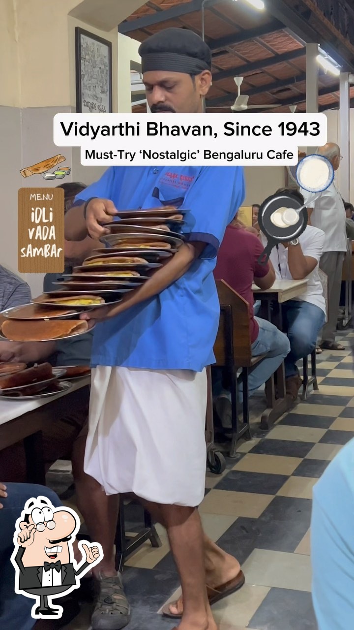 Take a seat at one of the tables at Vidyarthi Bhavan.