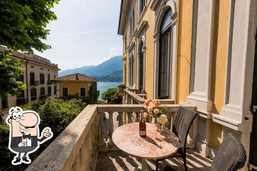 Take a seat at one of the tables at Grand Hotel Villa Serbelloni Terrace.