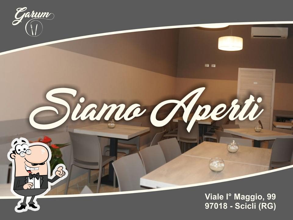 Siediti a un tavolo di Garum.