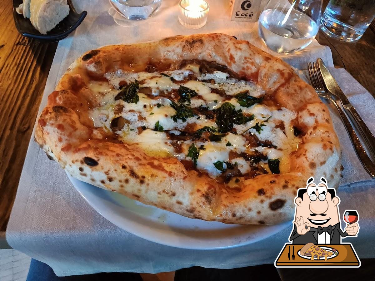 Prenditi una pizza a Cocò Km0 Restaurant & Pizza.