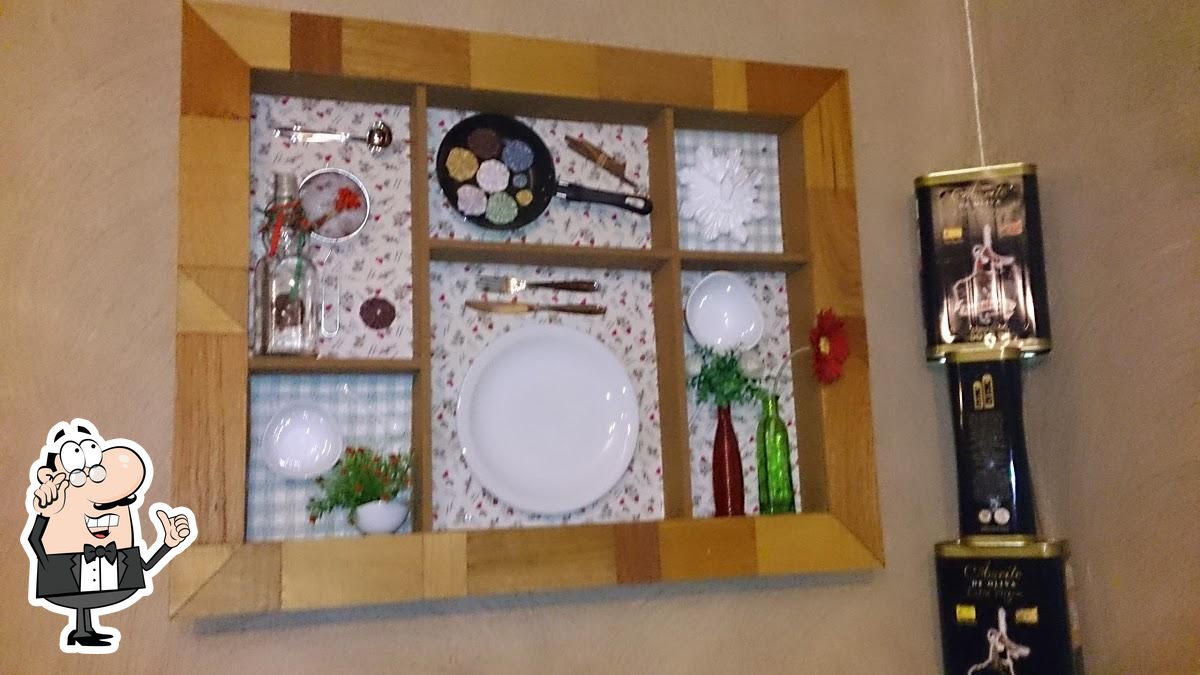 O interior do Bella Capri Pizzaria Ribeirão Treze.