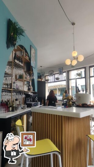 Take a seat at one of the tables at Le Bocal, l’Etal de la poissonnerie des halles.