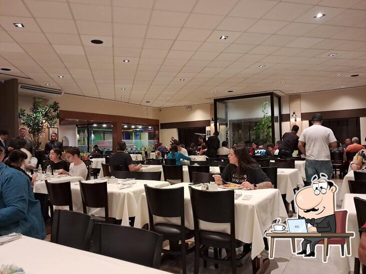 Veja imagens do interior do Estância Grill Churrascaria.