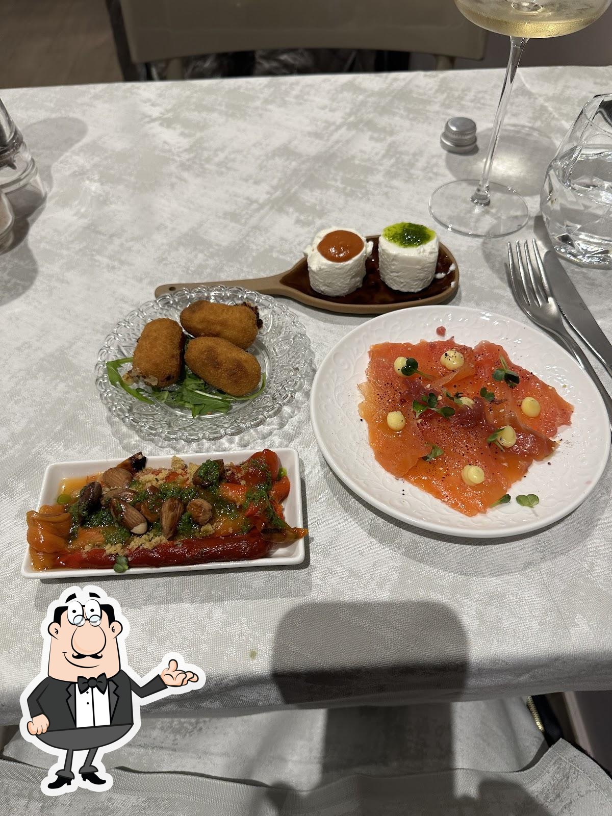 Siediti a un tavolo di Diecicento Enoteca Ristorante con il vizio della Pizza.