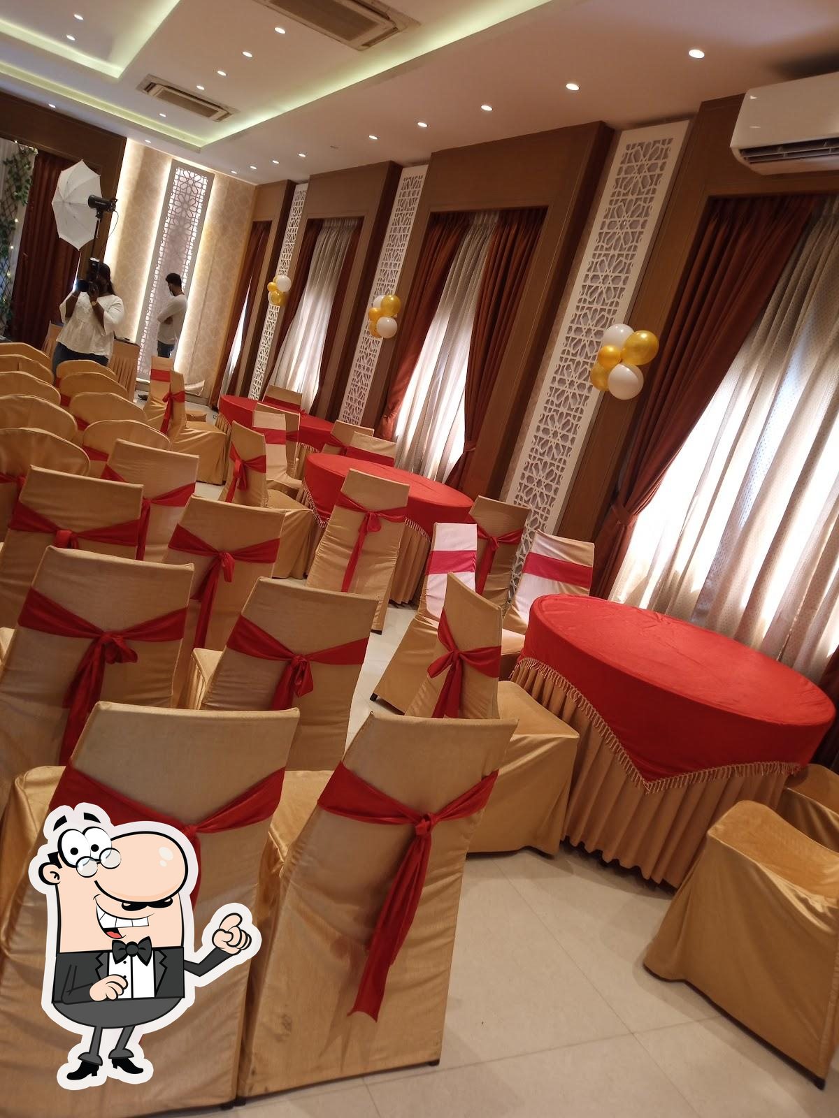 The interior of Palmshore Restaurant Ashok Nagar.