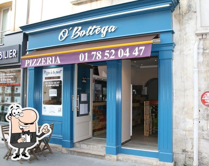 Installez-vous à l'une des tables de Pizzeria O'Bottega.