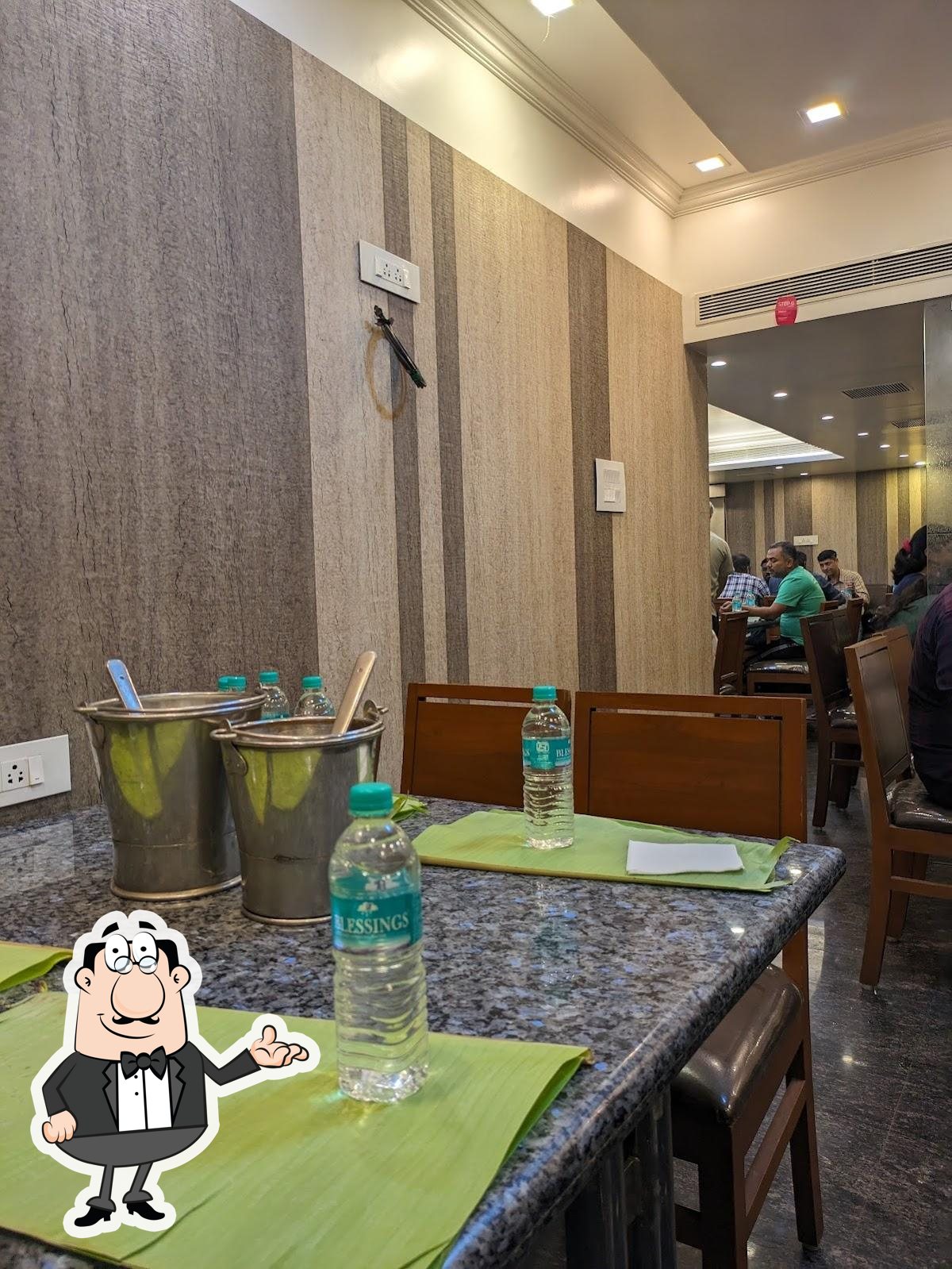 Take a seat at one of the tables at NAIR MESS.
