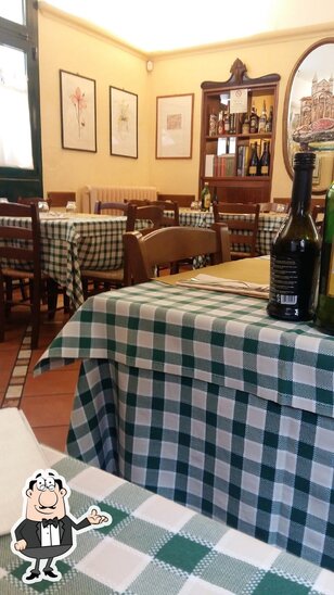 Siediti a un tavolo di Trattoria Del Giardinetto.