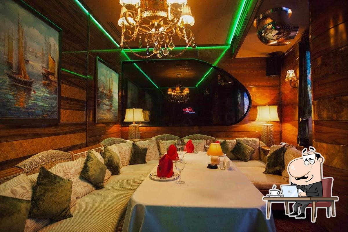 Take a seat at one of the tables at Lodka.