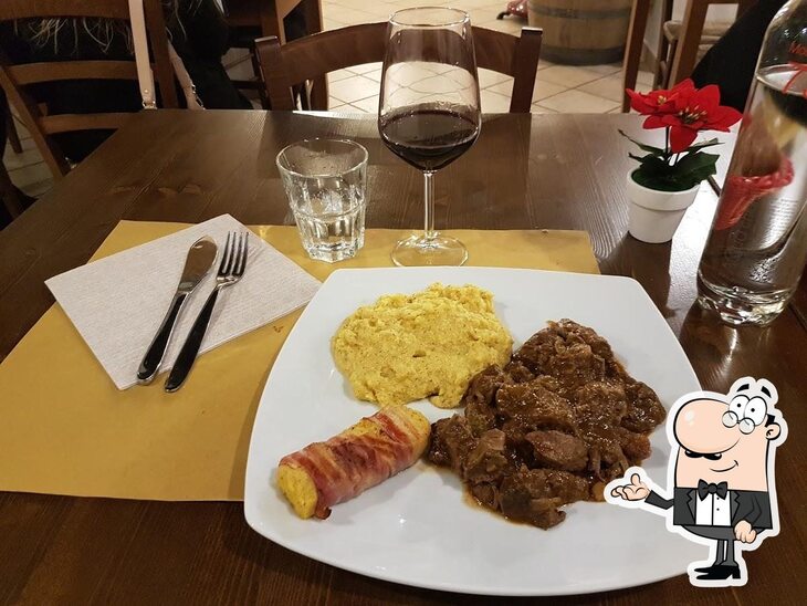 Siediti a un tavolo di Ristorante Porca Vacca - Tagliati per la Carne.