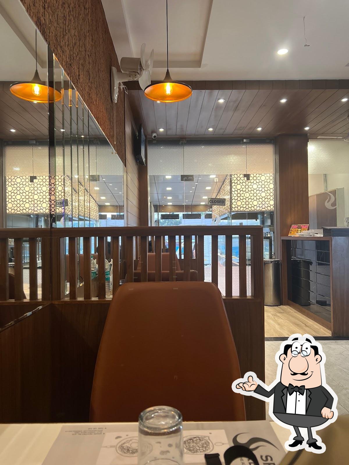 Take a seat at one of the tables at SPARK RESTRO.