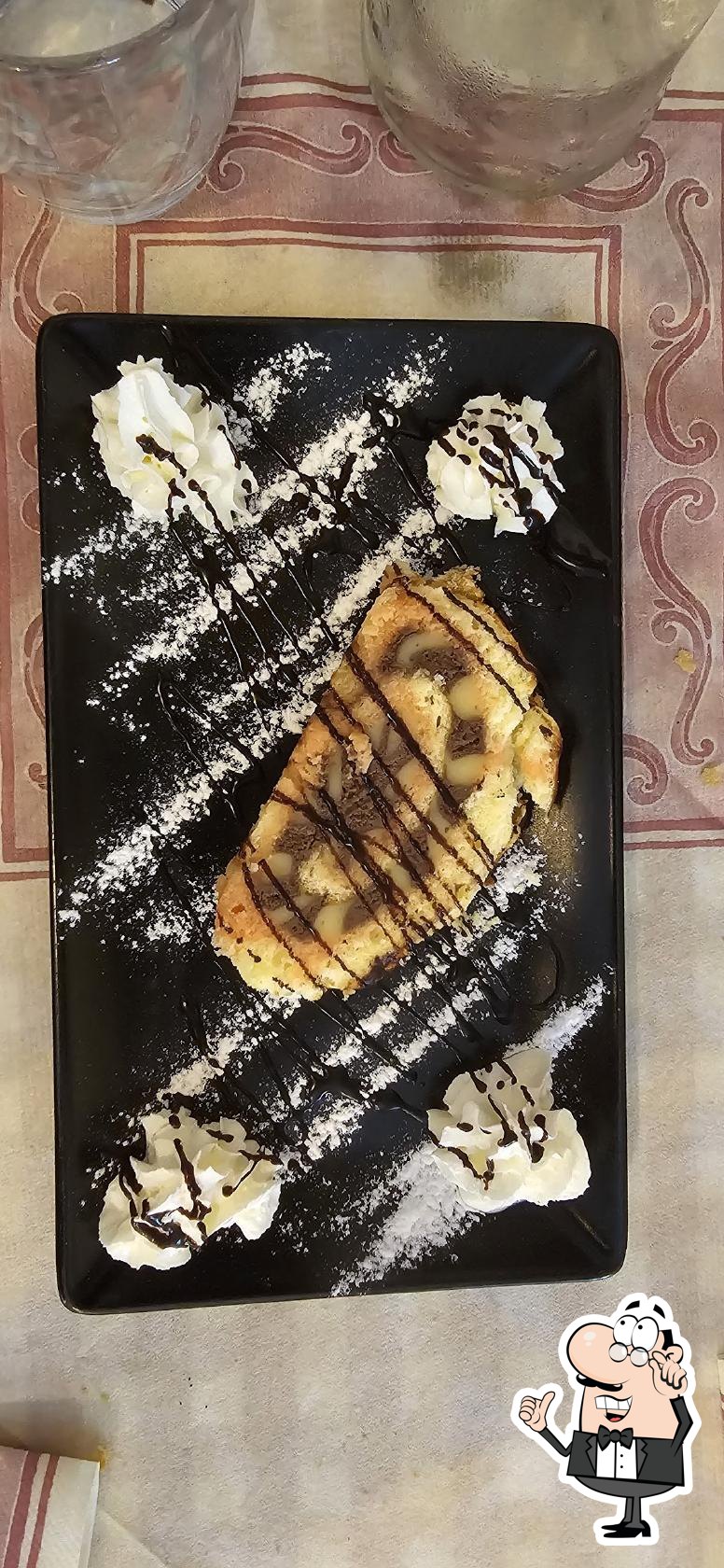 Dai un'occhiata agli interni di Osteria Il Grottino.
