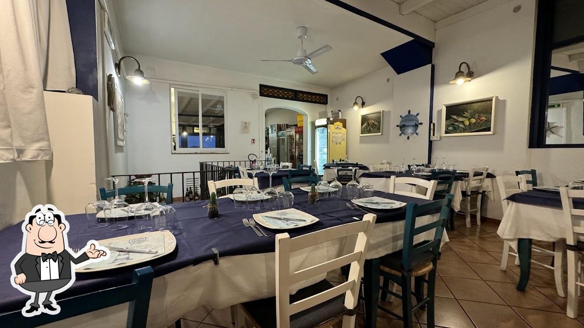 Dai un'occhiata agli interni di Arcobaleno Ristorante - Pizzeria da Angelo.