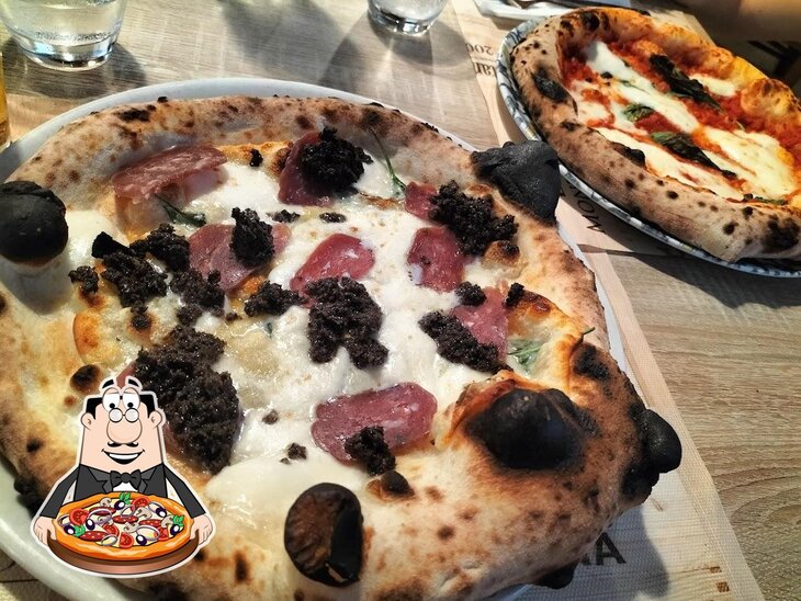 Scegli una pizza a Trattoria Da Marius.