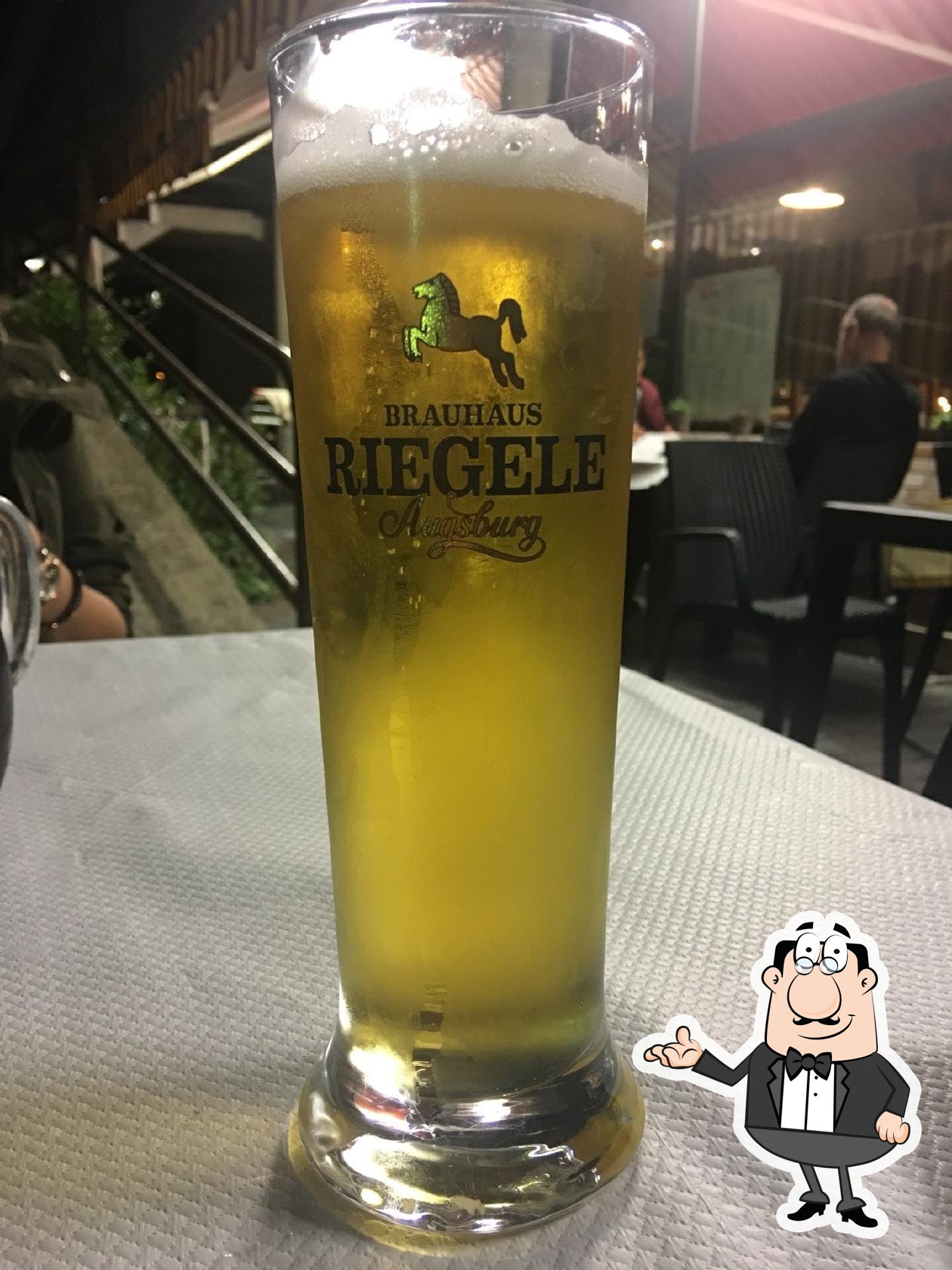 Siediti a un tavolo di Ristorante Pizzeria Soleado.