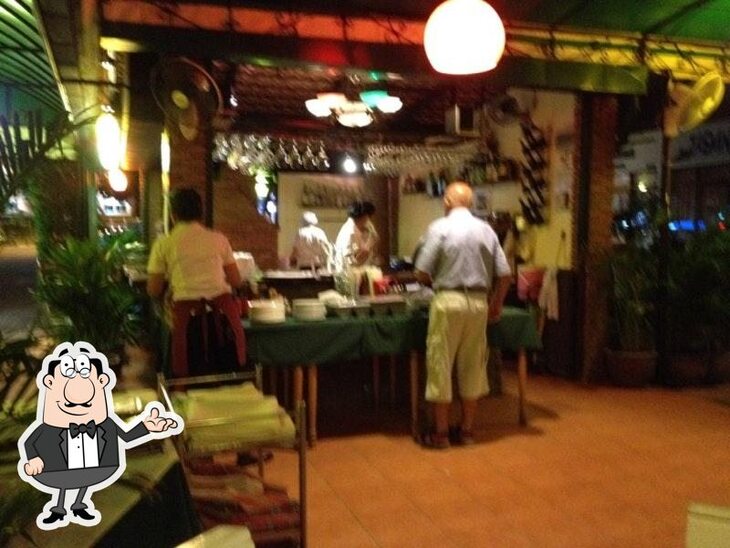 Take a seat at one of the tables at Trattoria Italiana Jomtien.