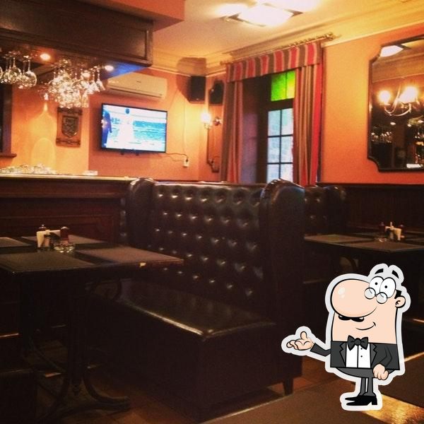 Take a seat at one of the tables at Restoran Bryussel.