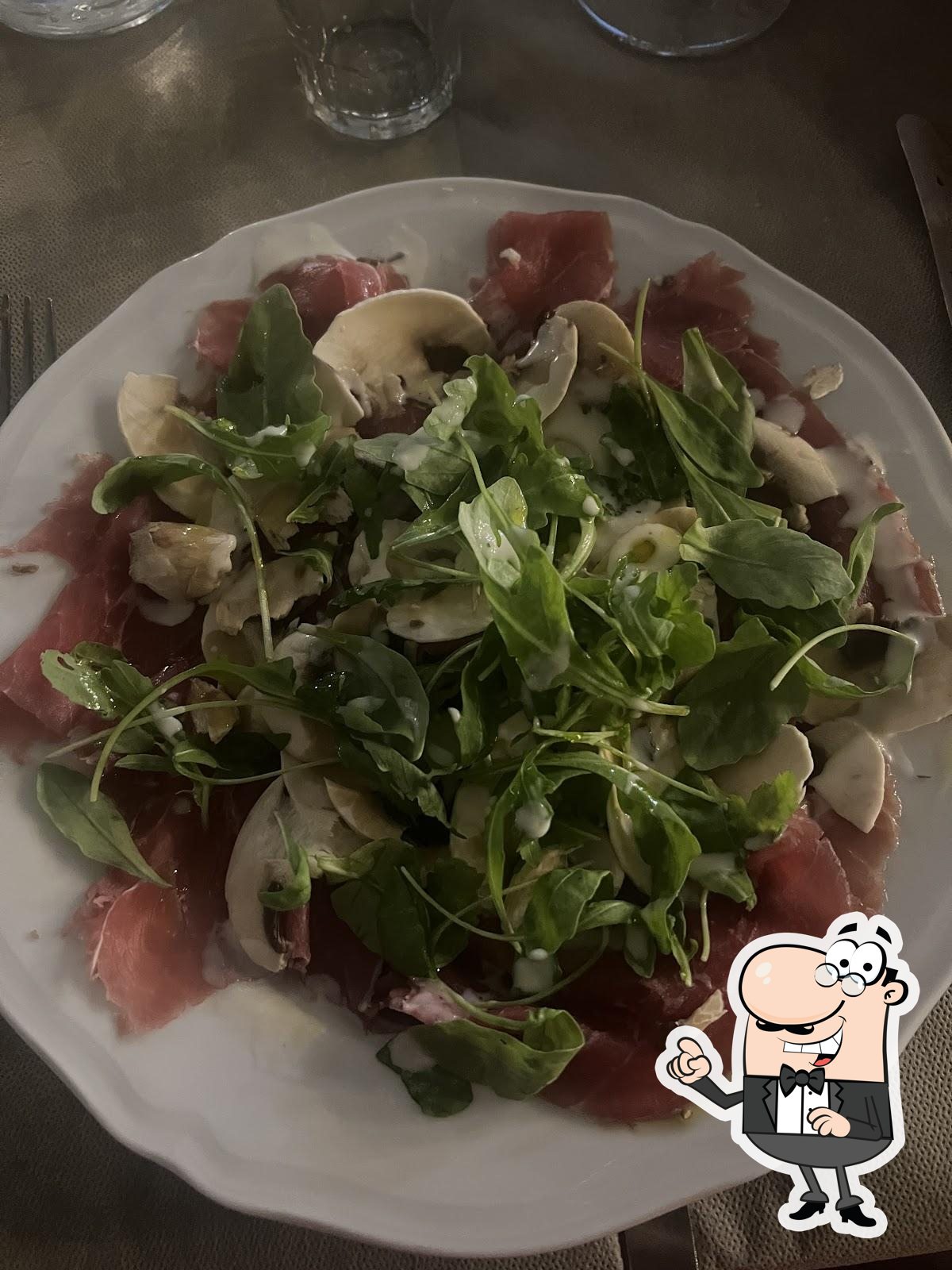 Siediti a un tavolo di Osteria del Mercato.