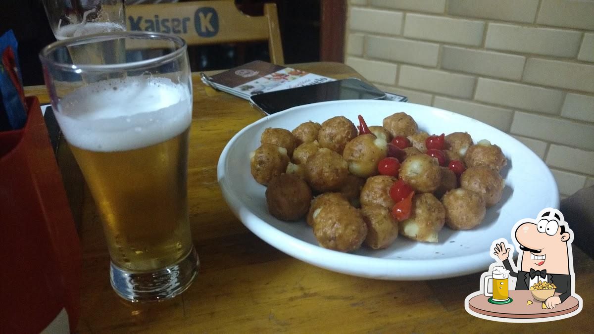 Você pode tomar uma tulipa de cerveja leve ou escura.