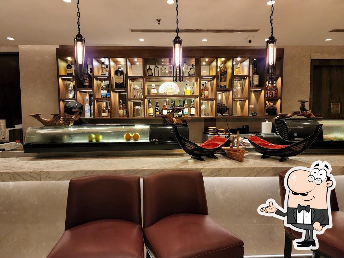 Take a seat at one of the tables at PaPaYa Modern Asian Bistro.