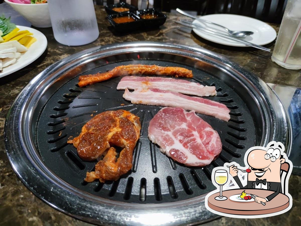 good beef and pork, there will be the scissors and tongs on each table for  cutting them into small pieces - Picture of Viking BBQ Korean Buffet,  Bangkok - Tripadvisor