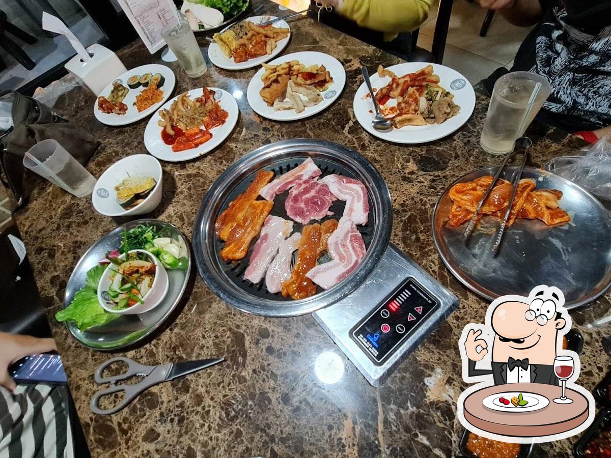 good beef and pork, there will be the scissors and tongs on each table for  cutting them into small pieces - Picture of Viking BBQ Korean Buffet,  Bangkok - Tripadvisor