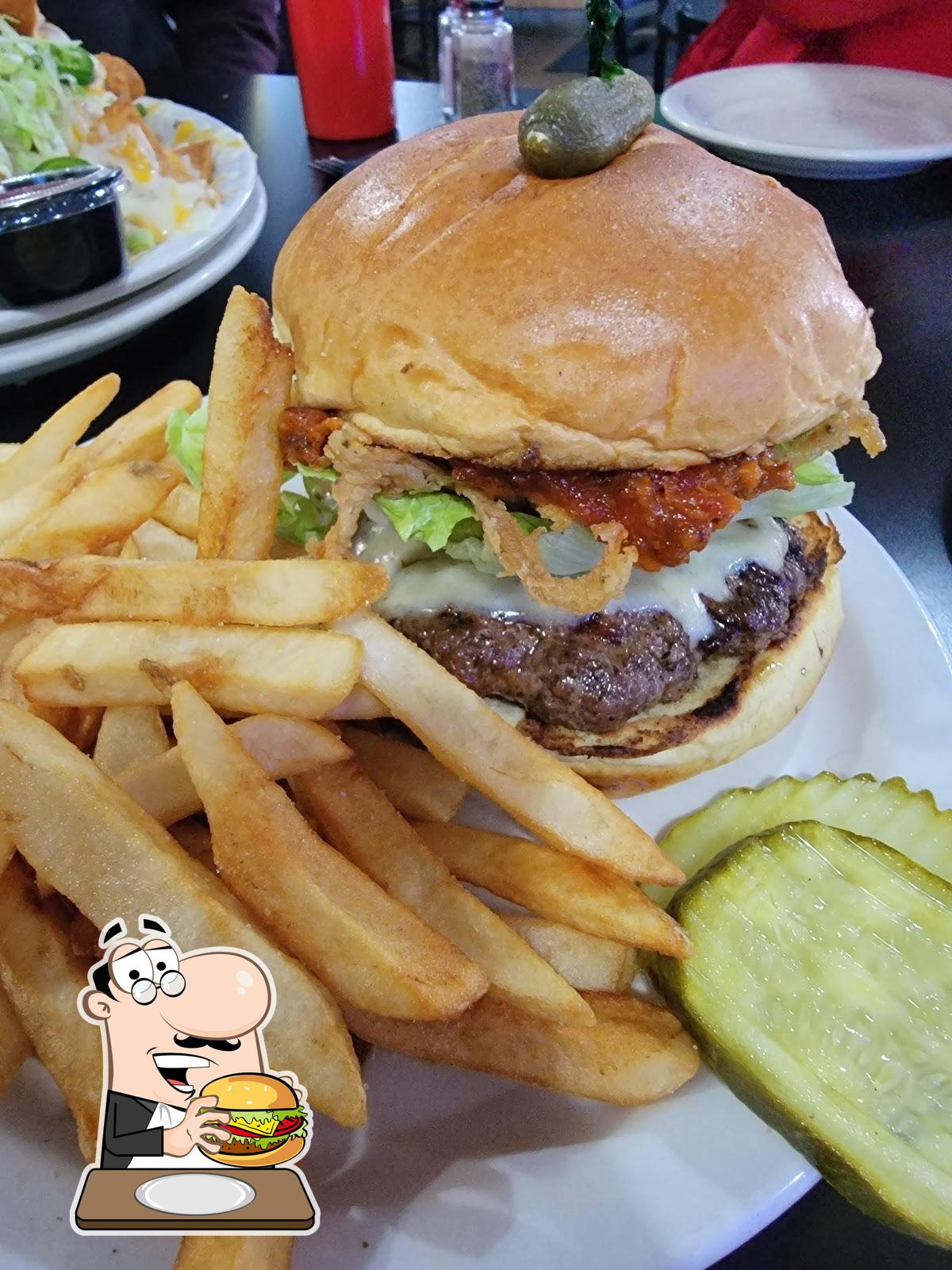 https://img.restaurantguru.com/r51c-The-BlackTop-Bar-and-Grill-burger-2022-09.jpg