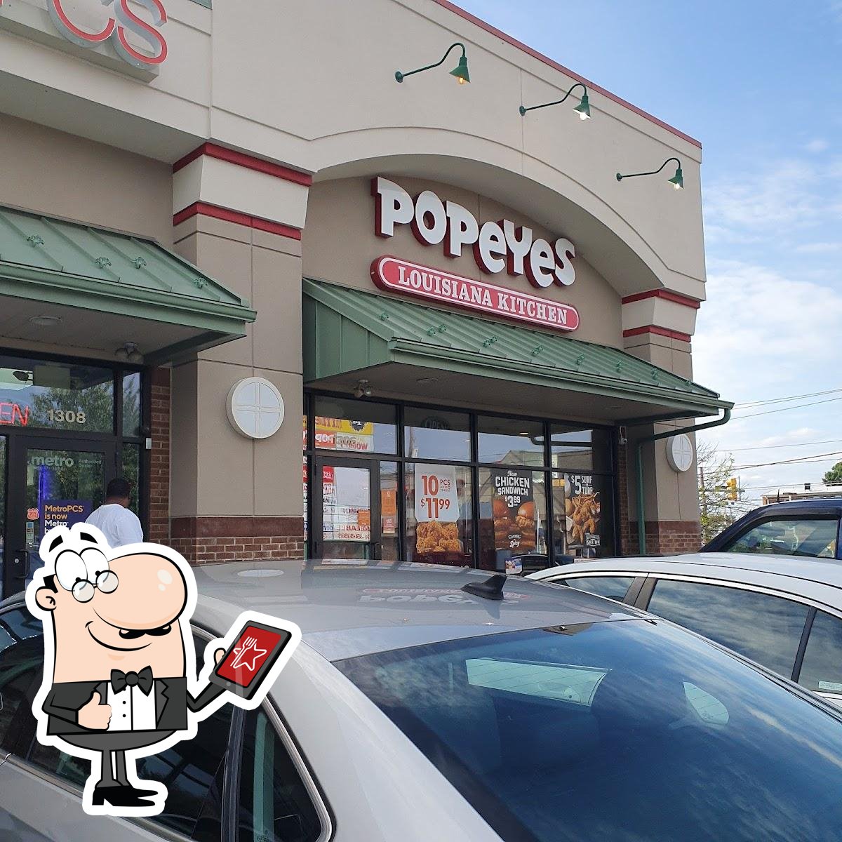 https://img.restaurantguru.com/r5c7-Popeyes-Louisiana-Kitchen-exterior-2022-12-620.jpg