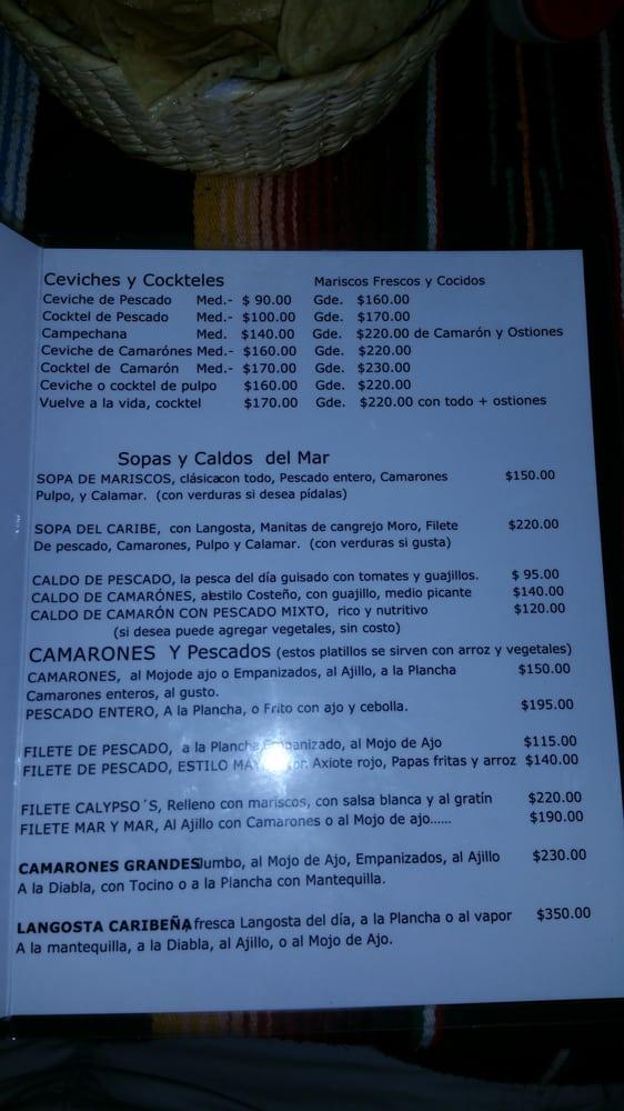 Menu at Calypso's restaurant, Cancún, near Selecto supermarket behind ...