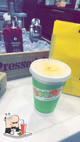 Boost cup with yoga mats - Picture of Boost Juice Bar, Manchester