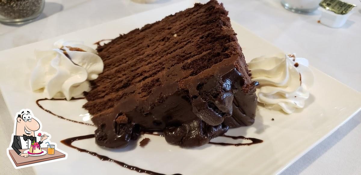 https://img.restaurantguru.com/r8e2-Grand-Island-Saddle-Club-dessert.jpg