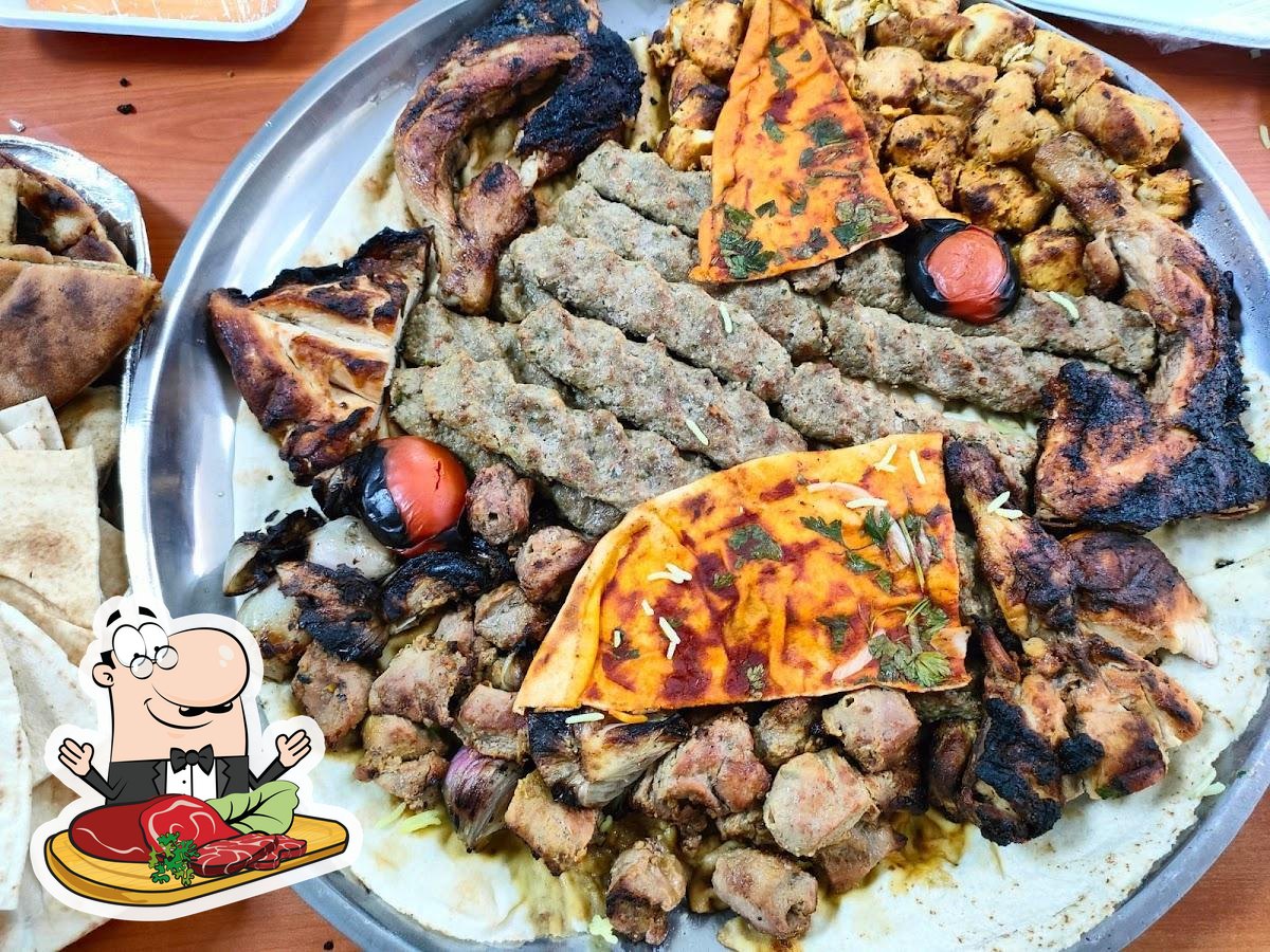 1 kilo mix grill served with hommos , veg and fries - Picture of Shams Al  Sham Restaurant, Ajman - Tripadvisor