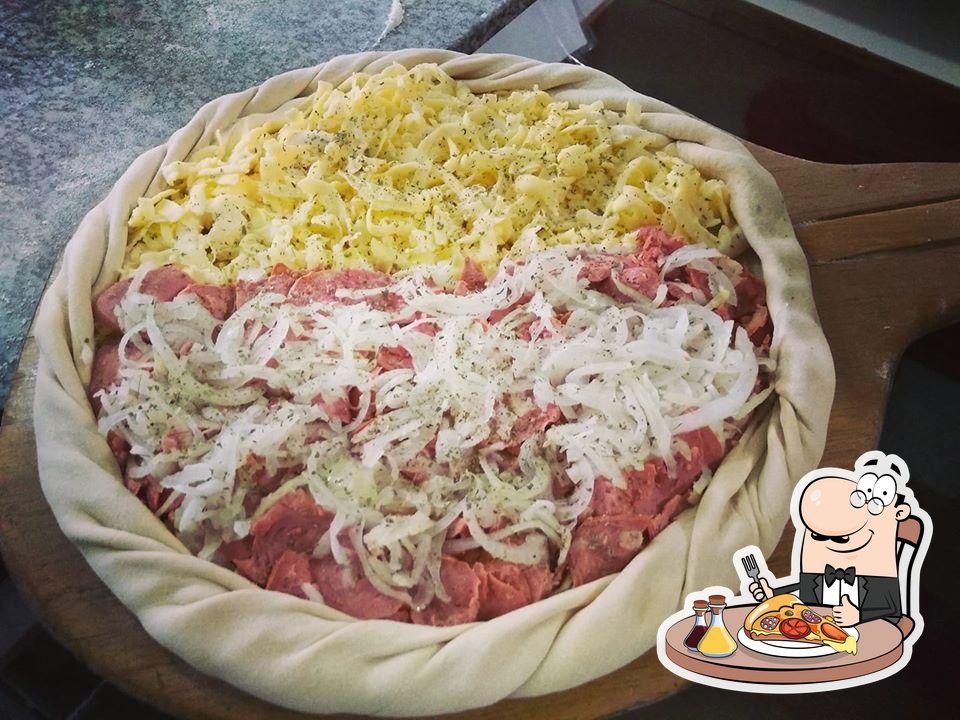 Pizza de calabresa com frango catupiry e borda de cheddar. - Picture of  Pizzaria Fratello, Bertioga - Tripadvisor