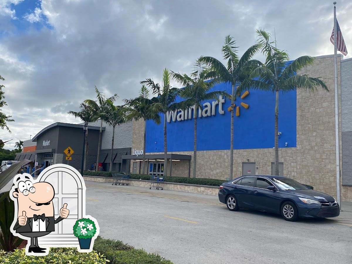 Miami Florida Hallandale Beach,Walmart Supercenter discount big box  department,shoes sneakers sandals reaching for looking at,cart  trolley,store store Stock Photo - Alamy, image size:1200x900