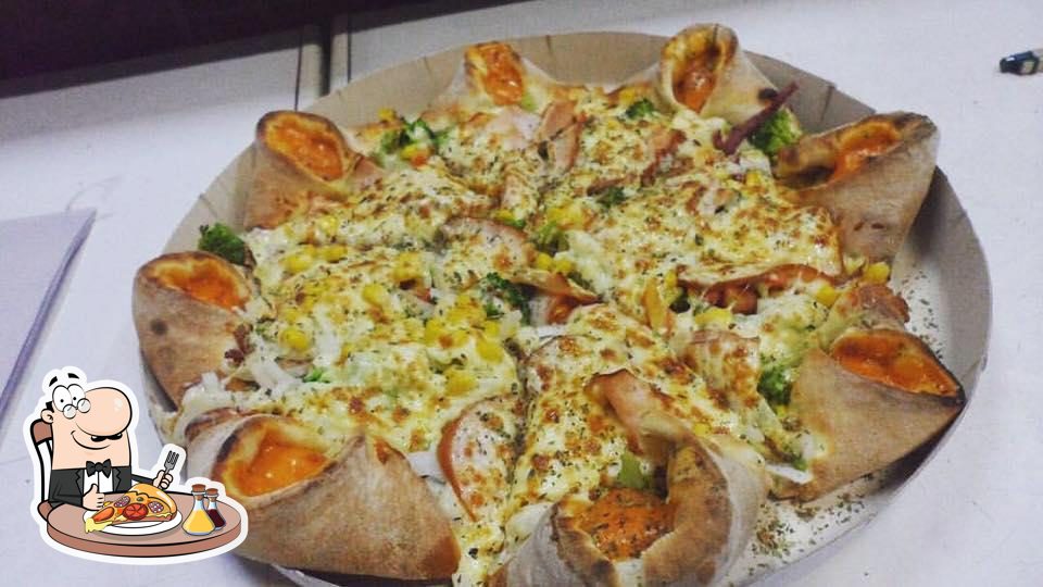 Pizza de calabresa com frango catupiry e borda de cheddar. - Picture of  Pizzaria Fratello, Bertioga - Tripadvisor