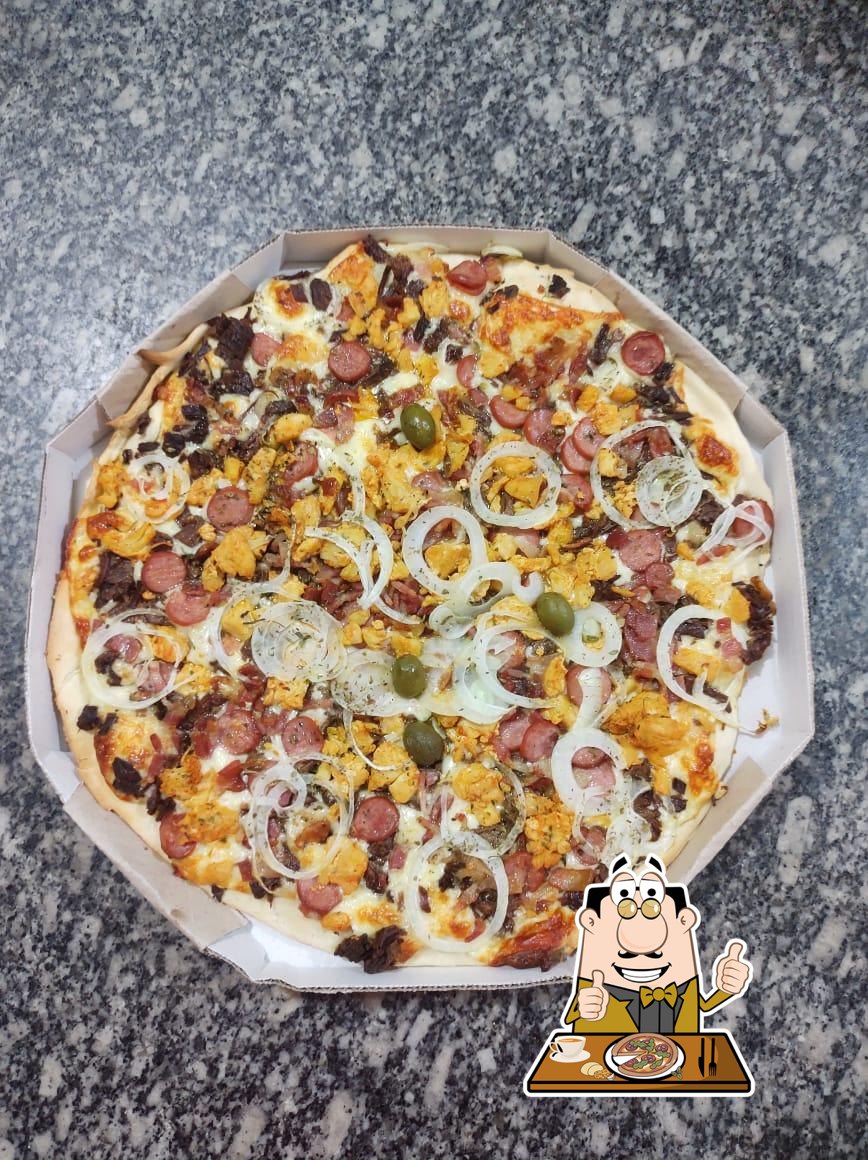 Pizza de calabresa com frango catupiry e borda de cheddar. - Picture of  Pizzaria Fratello, Bertioga - Tripadvisor