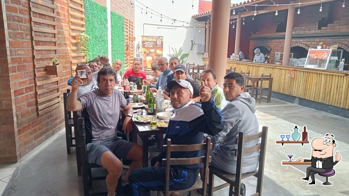 EL OVALO( Pollos Y Parrillas a la leña)