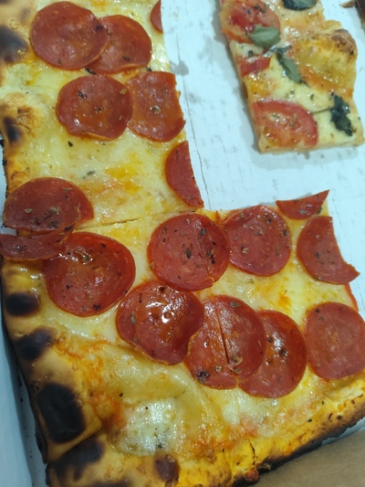 Graminha Pizza Por Metro foto