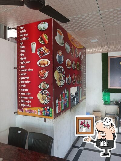 Take a seat at one of the tables at Hotel Matashri